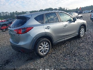 2013 Mazda CX-5, VIN JM3KE4CE5D0123203. Фото 4 з 6 з аукціону IAAI. Каталог авто зі США OpenDataCar.