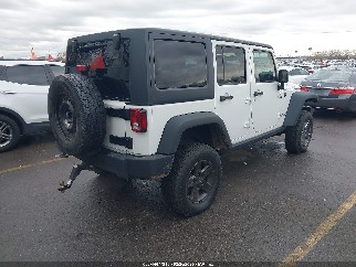 2015 Jeep Wrangler Unlimited, VIN 1C4BJWFG8FL728721. Фото 4 из 6 с аукциона IAAI. Каталог авто из США OpenDataCar.