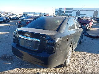 2016 Chevrolet Sonic, VIN 1G1JC5SHXG4115373. Фото 4 из 6 с аукциона IAAI. Каталог авто из США OpenDataCar.