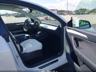 2024 Tesla Model Y, VIN 7SAYGDEE9RA320605. Фото 5 з 6 з аукціону IAAI. Каталог авто зі США OpenDataCar.