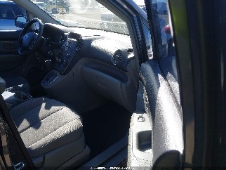 2007 Kia Rondo, VIN KNAFG525877121997. Фото 5 з 6 з аукціону IAAI. Каталог авто зі США OpenDataCar.