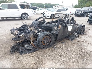 2011 Lotus Evora, VIN SCCLMDTU9BHA11107. Photo 2 of 6 from IAAI auction. OpenDataCar US salvage catalog.