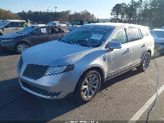 2016 Lincoln MKT, VIN 2LMHJ5ATXGBL01311. Фото 2 з 6 з аукціону IAAI. Каталог авто зі США OpenDataCar.