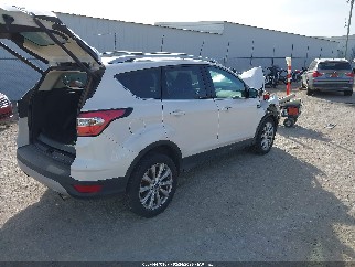 2017 Ford Escape, VIN 1FMCU0JD3HUE06700. Photo 4 of 6 from IAAI auction. OpenDataCar US salvage catalog.