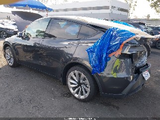 2026 Tesla Model Y, VIN 7SAYGDED1TF383053. Фото 3 из 6 с аукциона IAAI. Каталог авто из США OpenDataCar.
