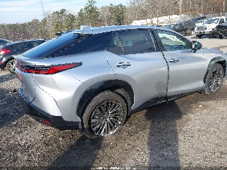 2023 Lexus RZ 450e, VIN JTJAAAAB4PA006134. Фото 4 з 6 з аукціону IAAI. Каталог авто зі США OpenDataCar.