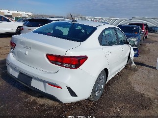 2023 Kia Rio, VIN 3KPA24AD9PE604431. Photo 4 of 6 from IAAI auction. OpenDataCar US salvage catalog.