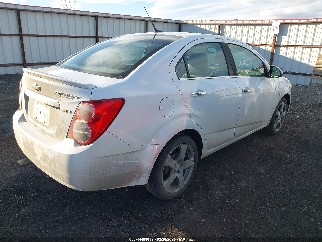 2013 Chevrolet Sonic, VIN 1G1JE5SB8D4242480. Фото 4 з 6 з аукціону IAAI. Каталог авто зі США OpenDataCar.