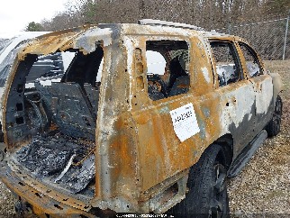 2018 Chevrolet Tahoe, VIN 1GNSKCKC4JR154887. Фото 4 из 6 с аукциона IAAI. Каталог авто из США OpenDataCar.