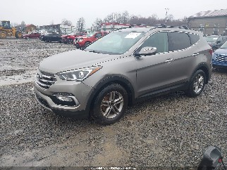2018 Hyundai Santa Fe, VIN 5NMZUDLB0JH064623. Zdjęcie 2 z 6 z aukcji IAAI. Katalog aut z USA OpenDataCar.