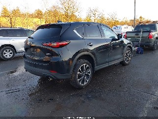 2022 Mazda CX-5, VIN JM3KFBEM2N1587194. Фото 4 з 6 з аукціону IAAI. Каталог авто зі США OpenDataCar.
