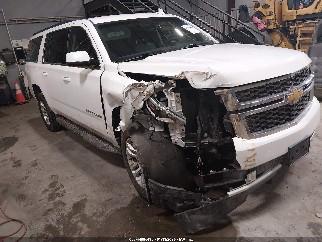 2019 Chevrolet Suburban, VIN 1GNSKHKC2KR129453. Photo 1 of 6 from IAAI auction. OpenDataCar US salvage catalog.