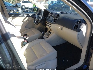 2016 Volkswagen Tiguan, VIN WVGBV7AX5GW514220. Фото 5 з 6 з аукціону IAAI. Каталог авто зі США OpenDataCar.