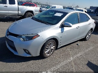 2014 Toyota Corolla, VIN 5YFBURHEXEP097089. Фото 2 з 6 з аукціону IAAI. Каталог авто зі США OpenDataCar.