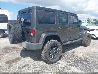 2014 Jeep Wrangler Unlimited, VIN 1C4BJWEG3EL297351. Фото 4 из 6 с аукциона IAAI. Каталог авто из США OpenDataCar.