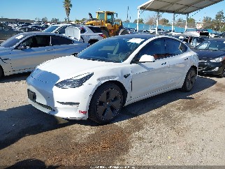 2023 Tesla Model 3, VIN 5YJ3E1EA3PF651382. Фото 2 з 6 з аукціону IAAI. Каталог авто зі США OpenDataCar.