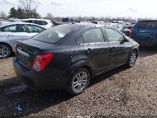 2014 Chevrolet Sonic, VIN 1G1JC5SH5E4121708. Zdjęcie 4 z 6 z aukcji IAAI. Katalog aut z USA OpenDataCar.