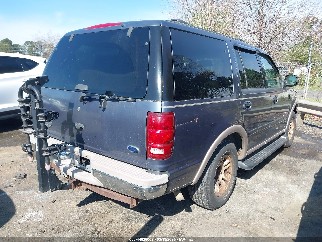 1999 Ford Expedition, VIN 1FMRU17L0XLA73519. Фото 4 з 6 з аукціону IAAI. Каталог авто зі США OpenDataCar.