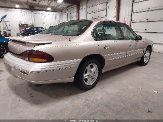 1999 Pontiac Bonneville, VIN 1G2HX52K3XH248866. Фото 4 из 6 с аукциона IAAI. Каталог авто из США OpenDataCar.