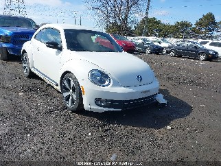 2013 Volkswagen Beetle, VIN 3VWV67AT4DM615043. Zdjęcie 1 z 6 z aukcji IAAI. Katalog aut z USA OpenDataCar.