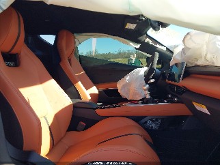 2025 Lotus Emira, VIN SCCLEJAX0SHA10923. Photo 5 of 6 from IAAI auction. OpenDataCar US salvage catalog.