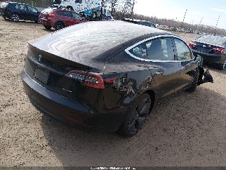 2019 Tesla Model 3, VIN 5YJ3E1EB0KF208673. Фото 4 из 6 с аукциона IAAI. Каталог авто из США OpenDataCar.