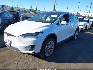 2020 Tesla Model X, VIN 5YJXCAE20LF241018. Фото 2 з 6 з аукціону IAAI. Каталог авто зі США OpenDataCar.