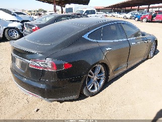 2014 Tesla Model S, VIN 5YJSA1H15EFP52844. Фото 4 из 6 с аукциона IAAI. Каталог авто из США OpenDataCar.