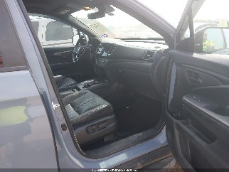 2022 Honda Passport, VIN 5FNYF8H67NB009862. Zdjęcie 5 z 6 z aukcji IAAI. Katalog aut z USA OpenDataCar.