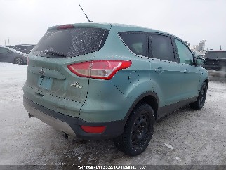 2013 Ford Escape, VIN 1FMCU0GXXDUC28456. Photo 4 of 6 from IAAI auction. OpenDataCar US salvage catalog.