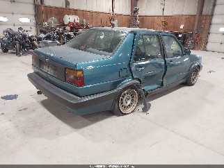 1992 Volkswagen Jetta, VIN WVWTE21G7NW005142. Фото 4 з 6 з аукціону IAAI. Каталог авто зі США OpenDataCar.