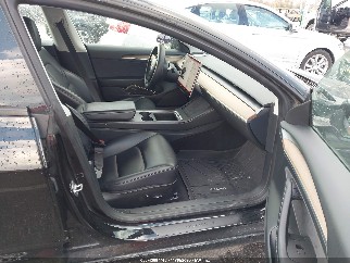 2023 Tesla Model 3, VIN 5YJ3E1EA4PF694208. Фото 5 з 6 з аукціону IAAI. Каталог авто зі США OpenDataCar.