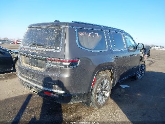 2023 Jeep Grand Wagoneer, VIN 1C4SJVGP2PS505350. Фото 4 из 6 с аукциона IAAI. Каталог авто из США OpenDataCar.