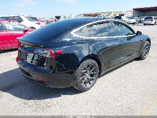 2019 Tesla Model 3, VIN 5YJ3E1EB5KF385672. Фото 4 з 6 з аукціону IAAI. Каталог авто зі США OpenDataCar.