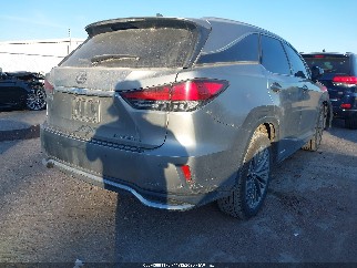 2021 Lexus RX 450hL, VIN JTJJGKFAXM2021084. Фото 4 з 6 з аукціону IAAI. Каталог авто зі США OpenDataCar.