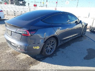 2022 Tesla Model 3, VIN 5YJ3E1EB7NF239648. Фото 4 з 6 з аукціону IAAI. Каталог авто зі США OpenDataCar.