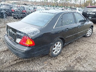 2000 Toyota Avalon, VIN 4T1BF28B9YU070380. Фото 4 з 6 з аукціону IAAI. Каталог авто зі США OpenDataCar.