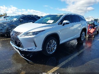 2021 Lexus RX 450hL, VIN JTJJGKFA4M2016799. Фото 2 з 6 з аукціону IAAI. Каталог авто зі США OpenDataCar.