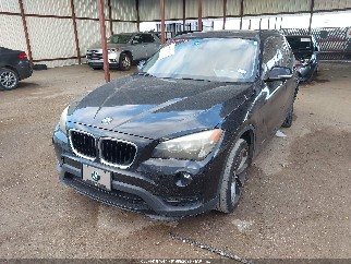 2015 Bmw X1, VIN WBAVM1C52FV497777. Фото 2 из 6 с аукциона IAAI. Каталог авто из США OpenDataCar.