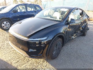 2026 Tesla Model Y, VIN 7SAYGDED1TF451710. Zdjęcie 2 z 6 z aukcji IAAI. Katalog aut z USA OpenDataCar.