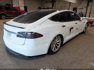 2015 Tesla Model S, VIN 5YJSA1H40FF088738. Фото 4 из 6 с аукциона IAAI. Каталог авто из США OpenDataCar.