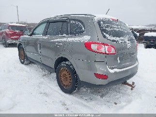 2012 Hyundai Santa Fe, VIN 5XYZGDAB8CG147448. Zdjęcie 3 z 6 z aukcji IAAI. Katalog aut z USA OpenDataCar.