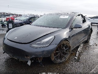 2021 Tesla Model 3, VIN 5YJ3E1EB9MF054869. Фото 2 з 6 з аукціону IAAI. Каталог авто зі США OpenDataCar.