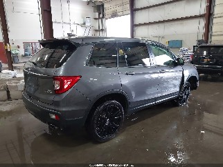2021 Honda Passport, VIN 5FNYF8H22MB011255. Фото 4 з 6 з аукціону IAAI. Каталог авто зі США OpenDataCar.