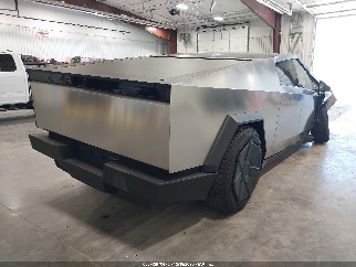 2025 Tesla Cybertruck, VIN 7G2CEHEE1SA060806. Photo 4 of 6 from IAAI auction. OpenDataCar US salvage catalog.