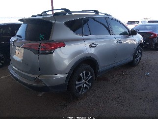 2018 Toyota RAV4, VIN JTMZFREV3JJ175949. Фото 4 из 6 с аукциона IAAI. Каталог авто из США OpenDataCar.