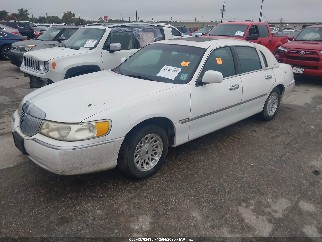 1999 Lincoln Town Car, VIN 1LNFM82W2XY600492. Фото 2 з 6 з аукціону IAAI. Каталог авто зі США OpenDataCar.