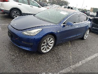 2018 Tesla Model 3, VIN 5YJ3E1EA9JF048590. Фото 2 з 6 з аукціону IAAI. Каталог авто зі США OpenDataCar.