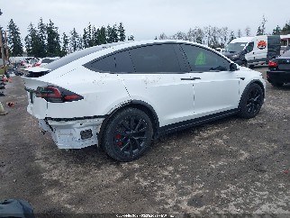 2022 Tesla Model X, VIN 7SAXCAE51NF357196. Фото 4 из 6 с аукциона IAAI. Каталог авто из США OpenDataCar.