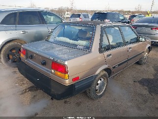 1985 Toyota Corolla, VIN JT2AE83E1F3231386. Zdjęcie 4 z 6 z aukcji IAAI. Katalog aut z USA OpenDataCar.